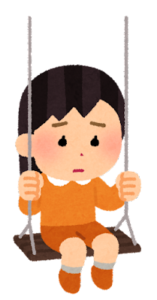 ブランコに乗って悲しそうな顔をしている女の子のイラスト
